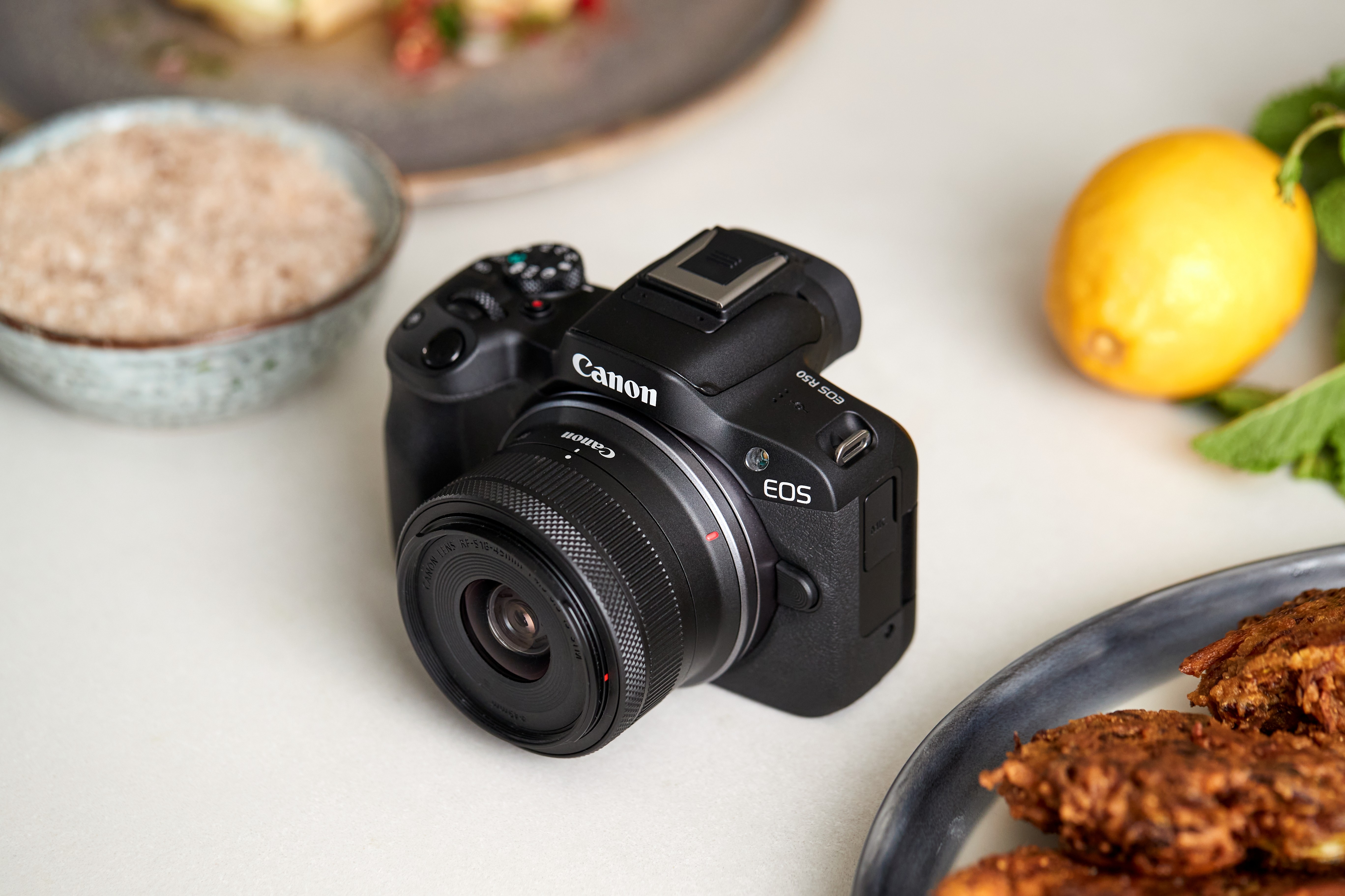 _EOS R50_Ambient_High-Angle_Black_Camera_Food_Setup